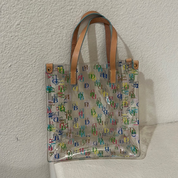 Dooney & Bourke Handbags - Dooney & Bourke Clear Tote with Multicolor DB Logo and Tan Handles
